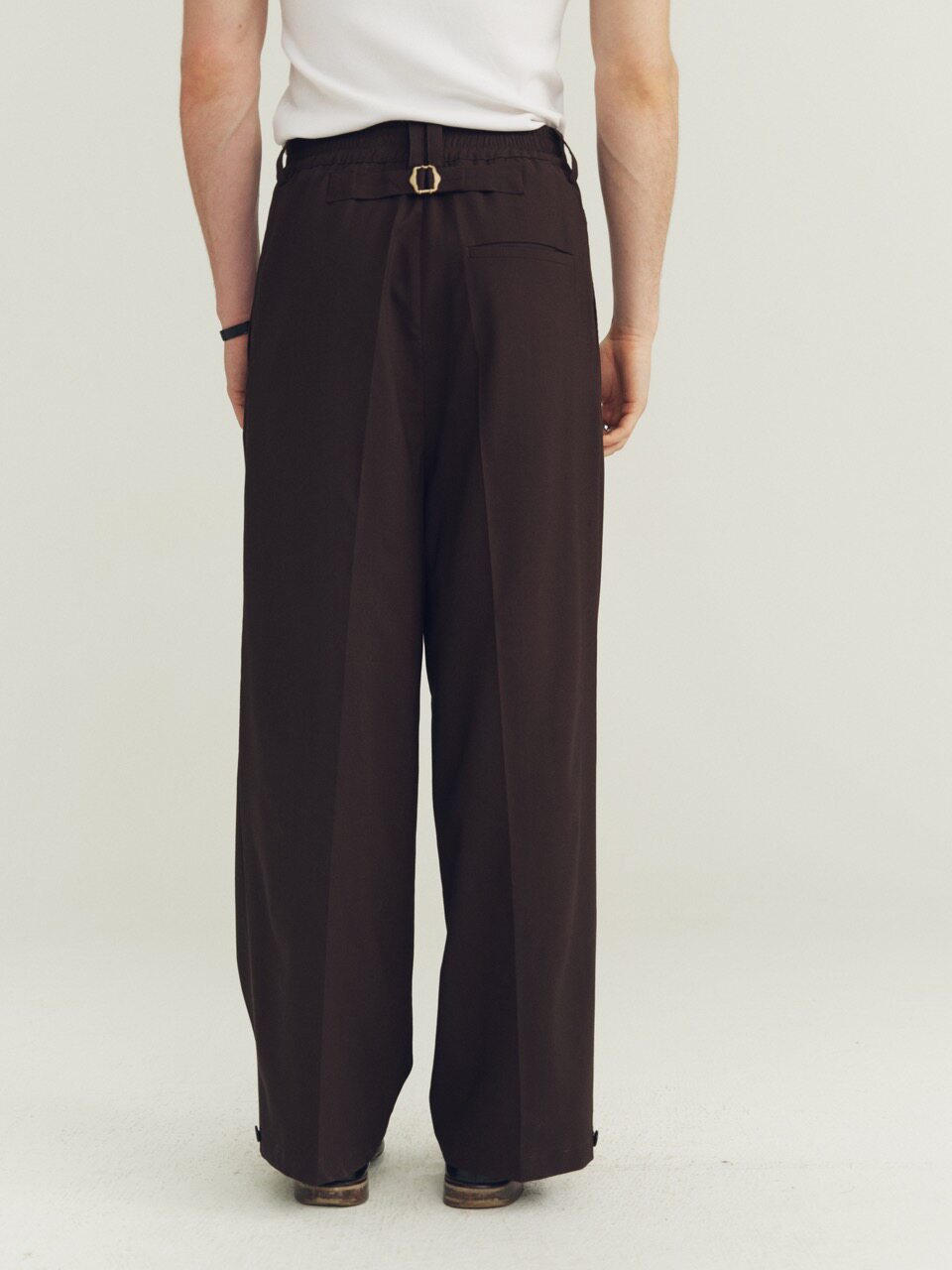 THE PROUDER classic-fit slightly loose pleated wool trousers