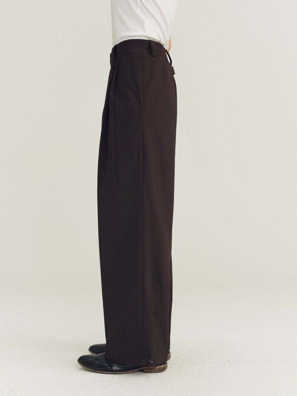 THE PROUDER classic-fit slightly loose pleated wool trousers