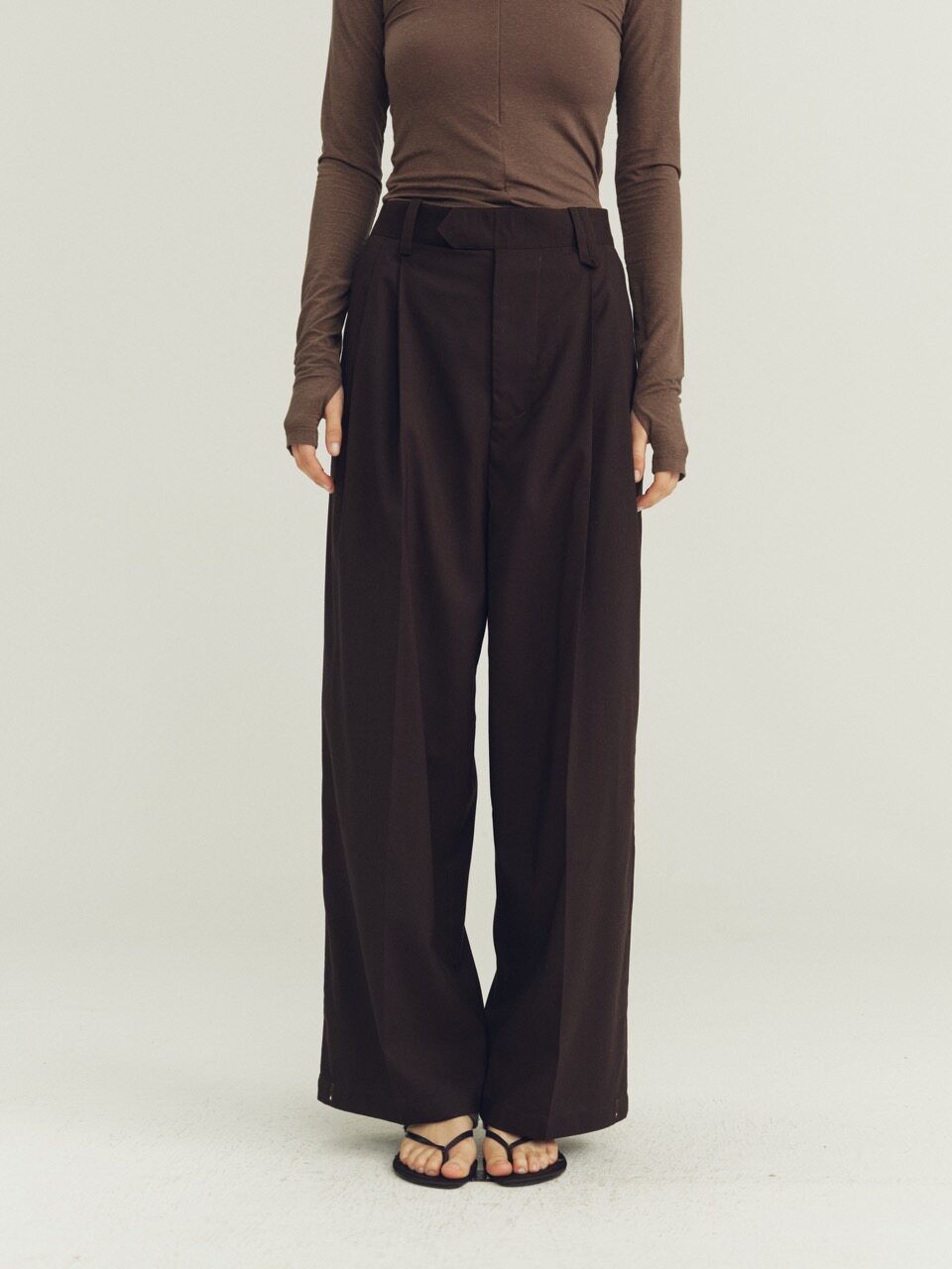 THE PROUDER classic-fit slightly loose pleated wool trousers