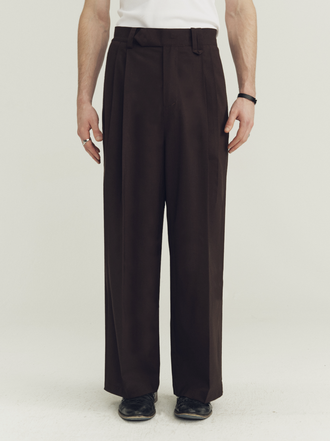 THE PROUDER classic-fit slightly loose pleated wool trousers